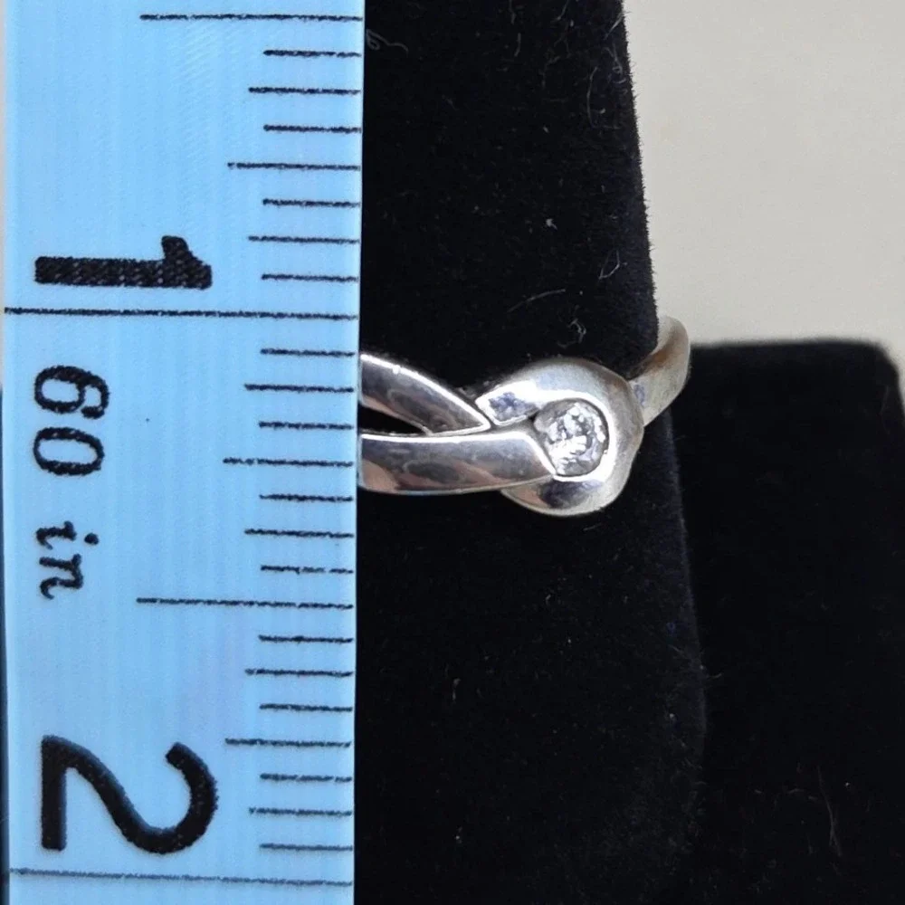 Silver Tone Infinity Knot Bypass Wrap Ring Clear Round Stone Size 10 AS IS